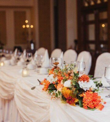 Elegant dining setup with floral centrepieces at Hamlet Court Hotel.