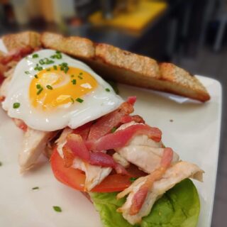 Hearty breakfast with eggs, bacon, and toast at Hamlet Court Hotel.