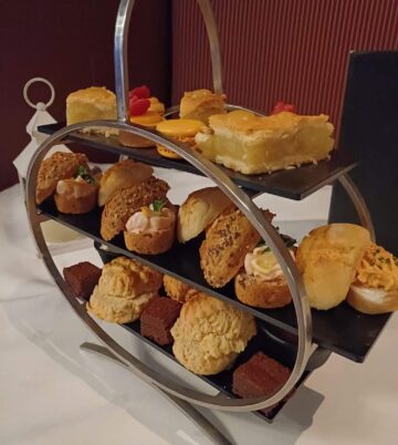 Afternoon tea selection with pastries and scones at Hamlet Court Hotel.