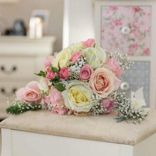 Elegant floral bouquet in cosy hotel room setting